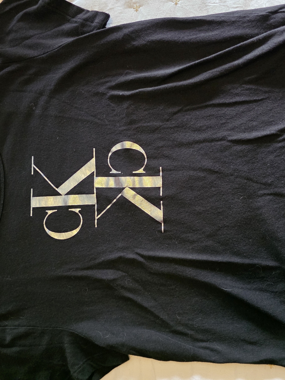 Calvin Klein Jeans Black Tee with Gold Metallic Logo